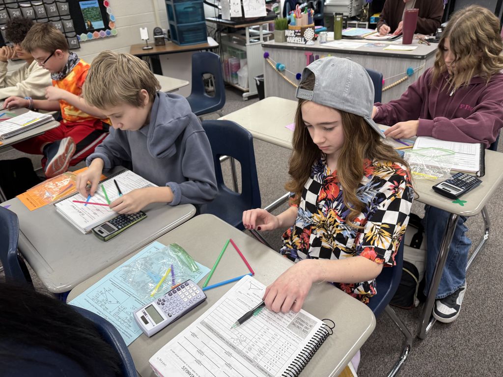 We learned that not all STRAWS can be combined to make a triangle - "Triangle Inequality Theroem"  Math Made FUN!!!  Some students really tried hard to make each combination work.