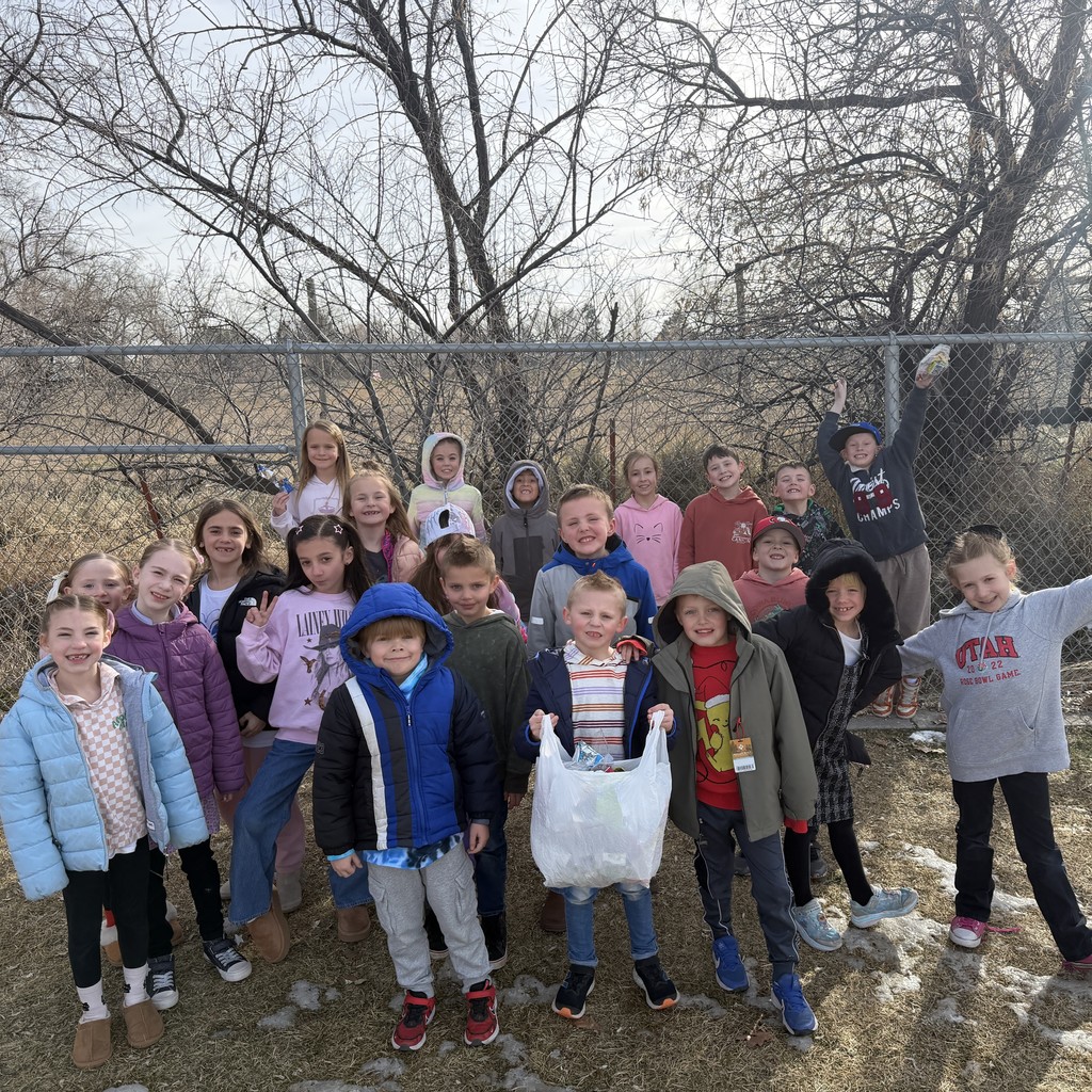kids cleaning up trash from the playground