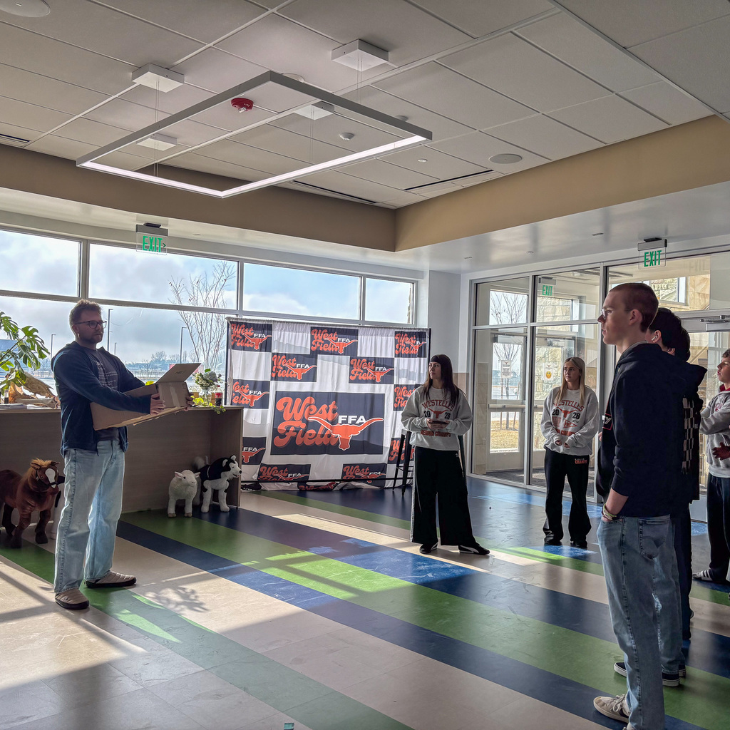 Students in hallways welcoming 9th graders