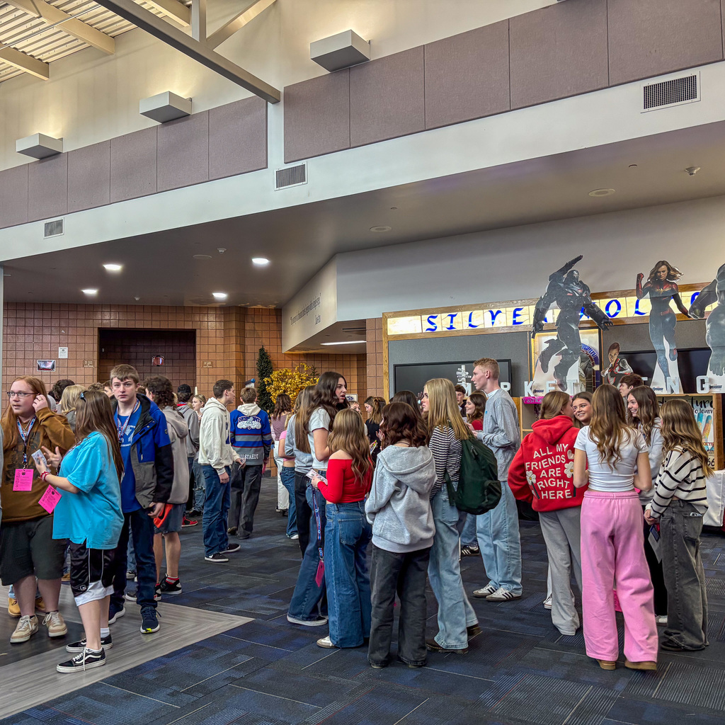 Students in hallways welcoming 9th graders