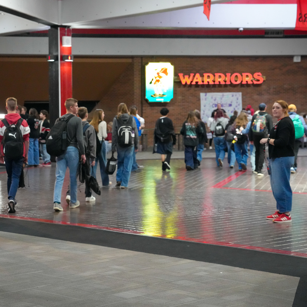 Students in hallways welcoming 9th graders