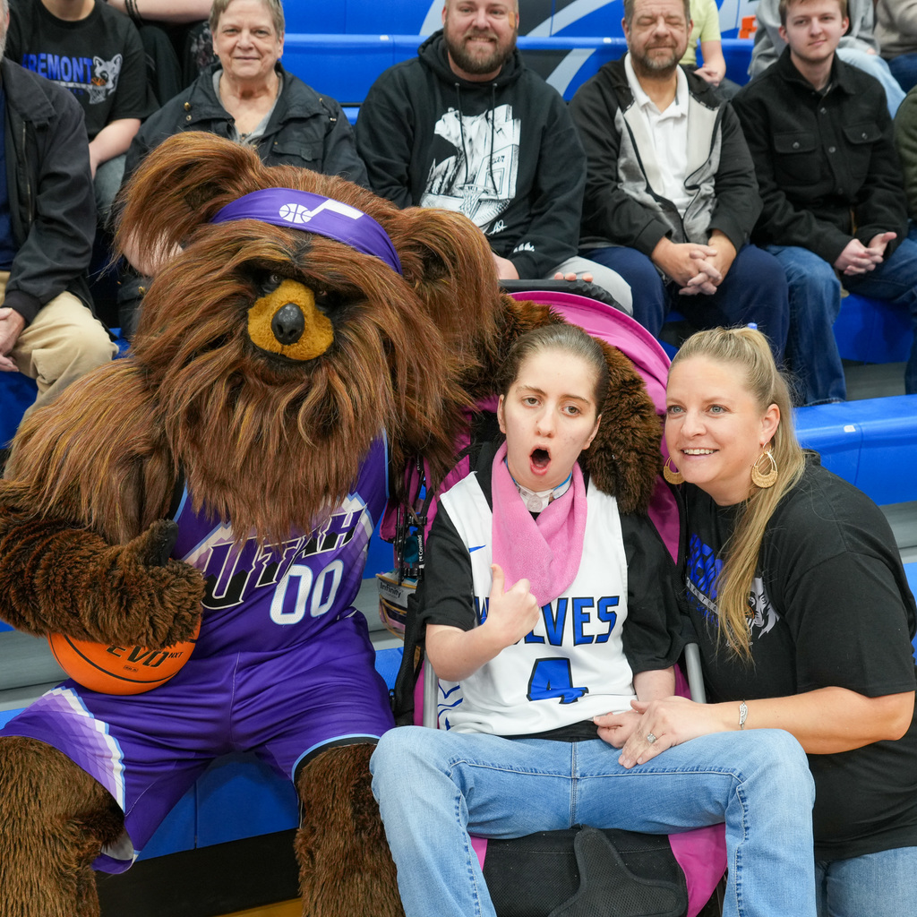 Unified basketball players with Jazz bear