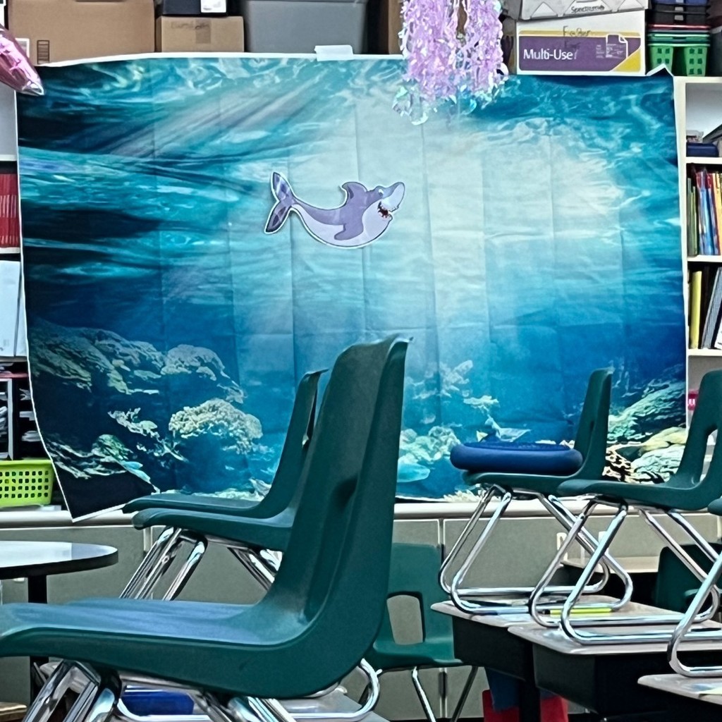 a banner with a fish in the ocean