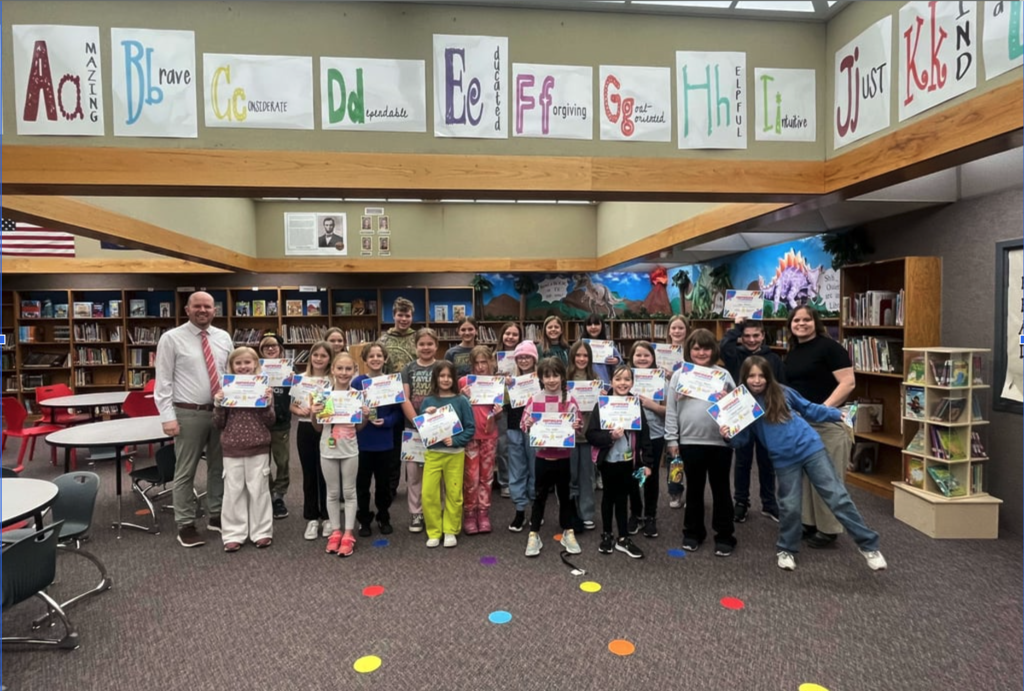 students with awards in the library