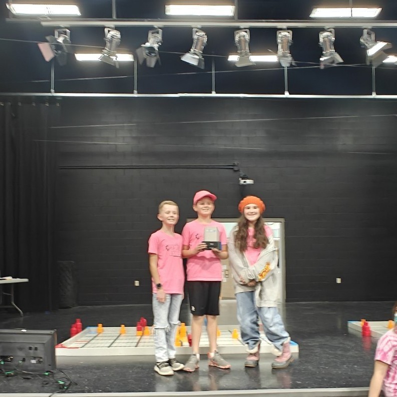 students accepting an award. 