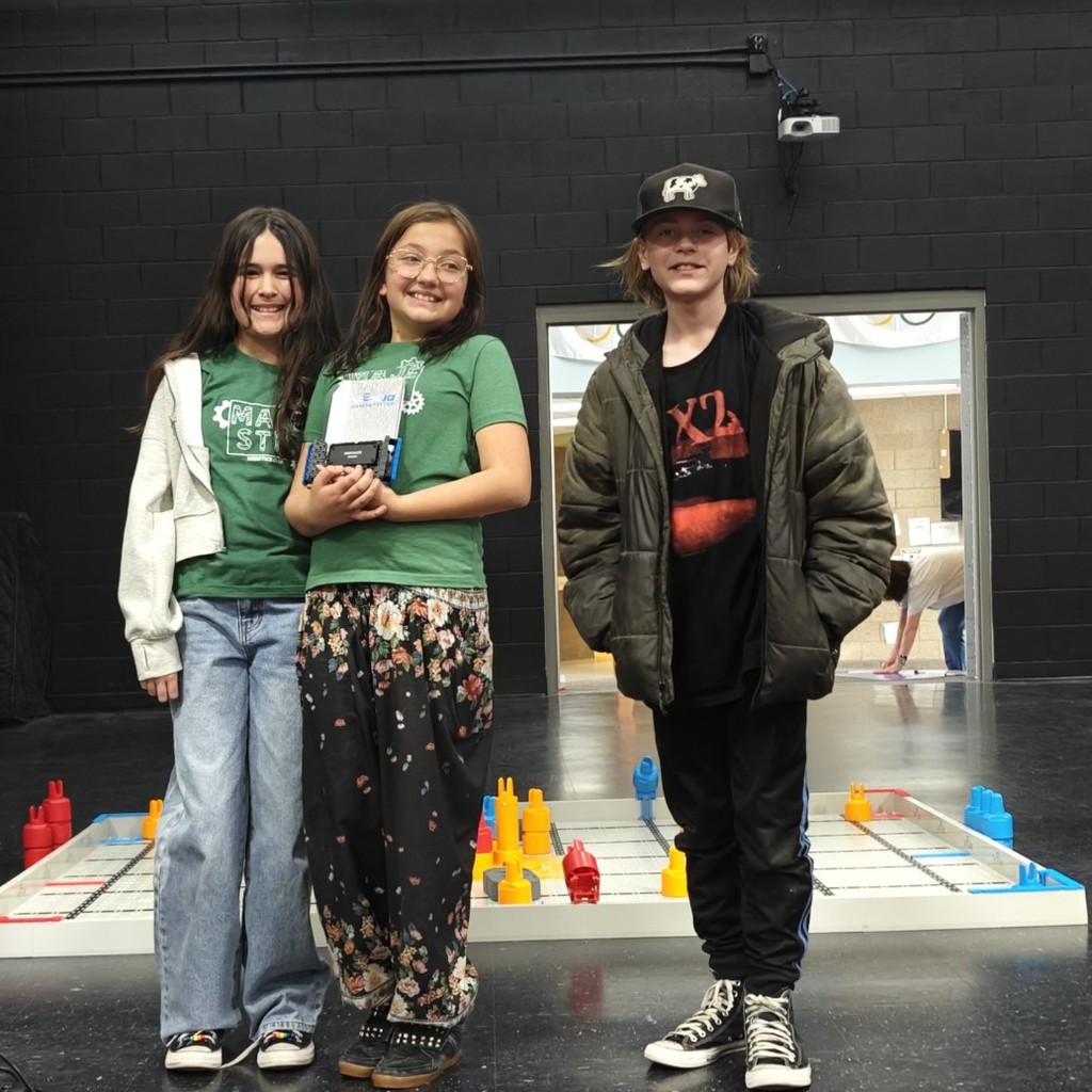 students accepting an award. 