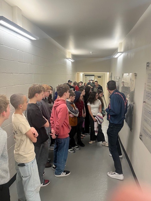 Theatre II classes in costume for staged reading of Everyman.