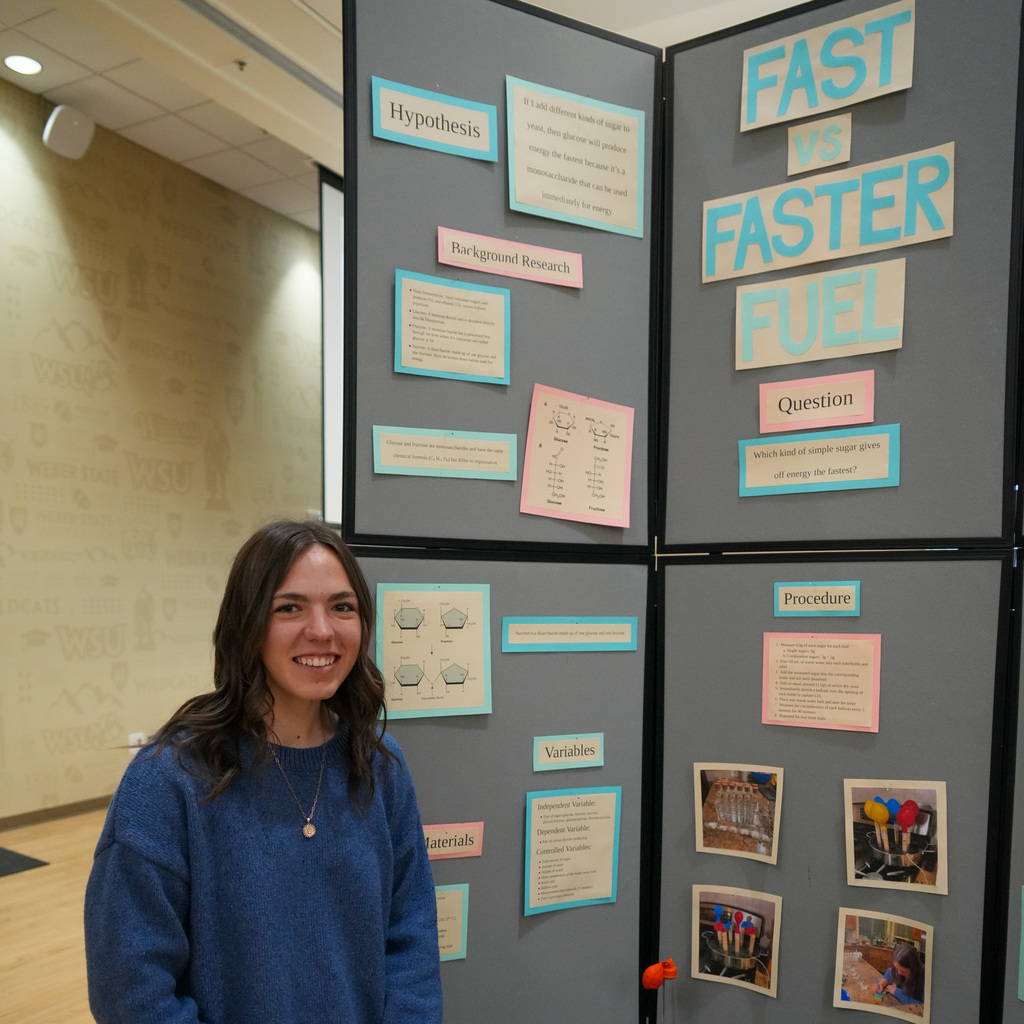 Stem Fair students standing with their projects.