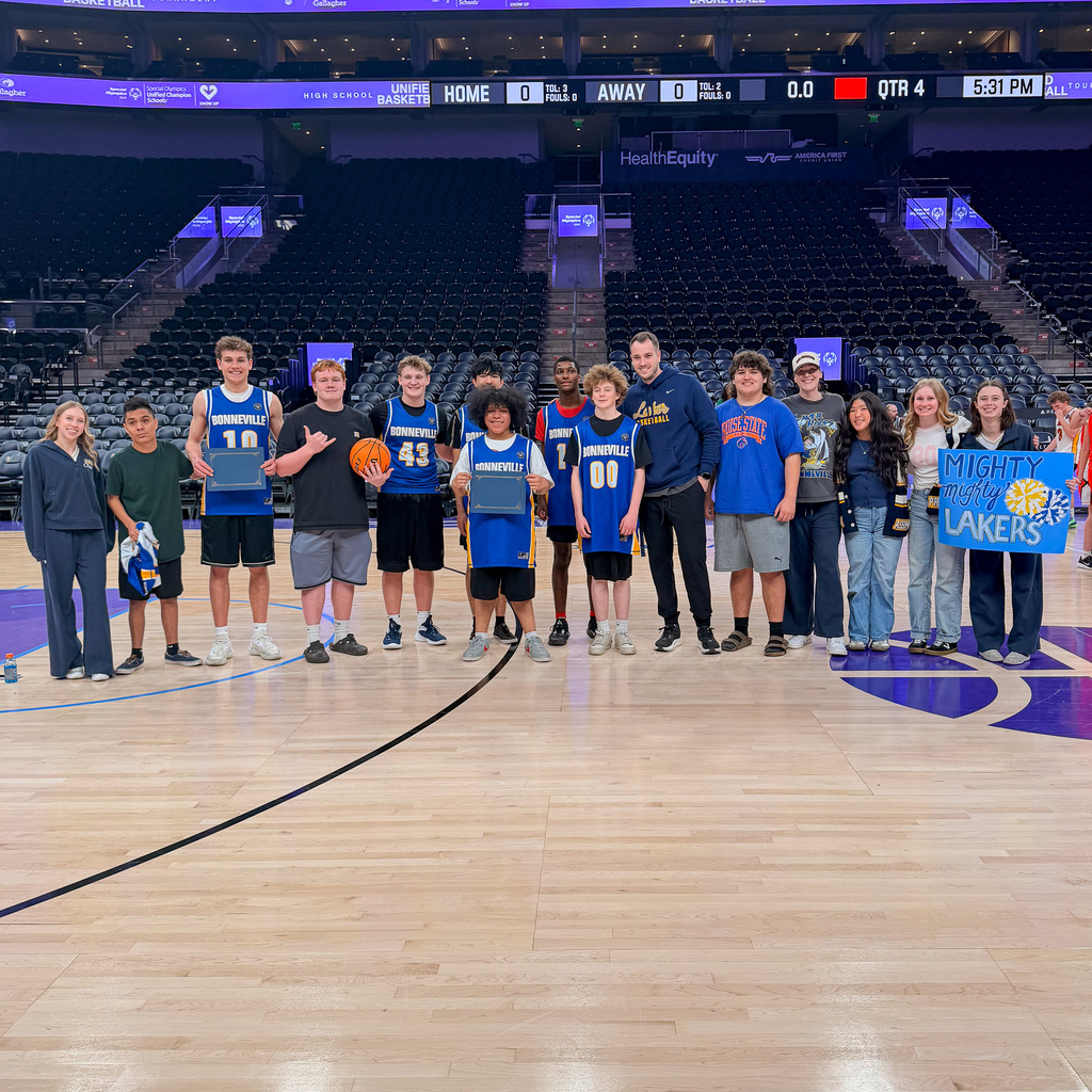 Bonneville Make Waves Team photo on the court at the Delta Center