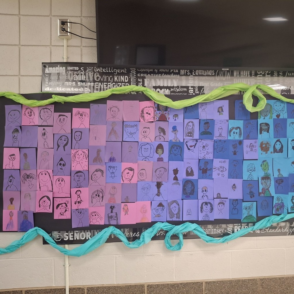 student's self portraits on different colored backgrounds