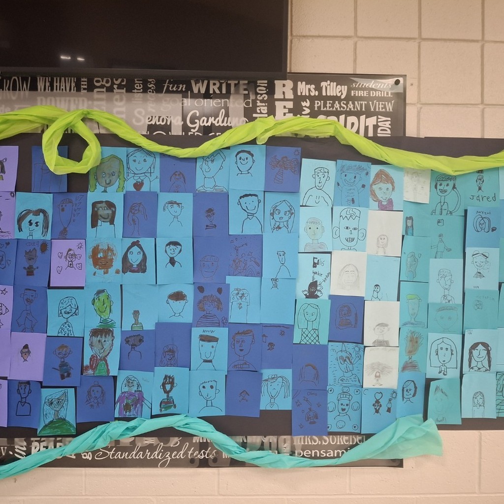 student's self portraits on different colored backgrounds