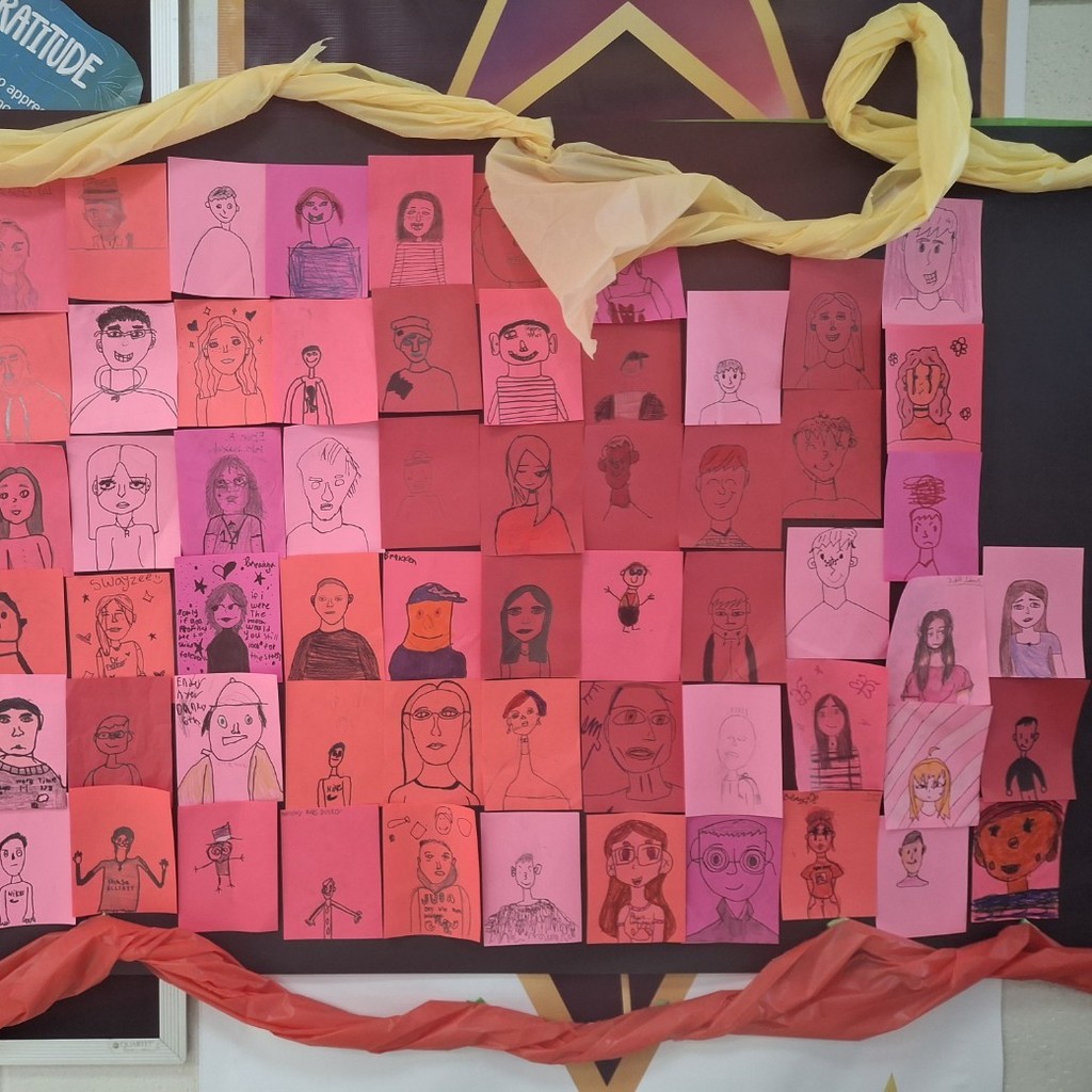 student's self portraits on different colored backgrounds 