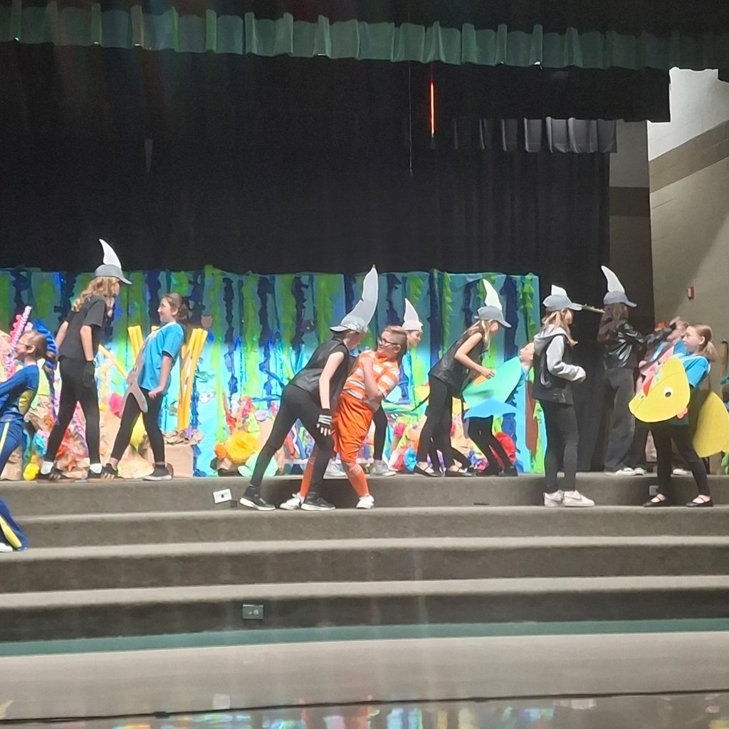 the sharks leaning at the other fish