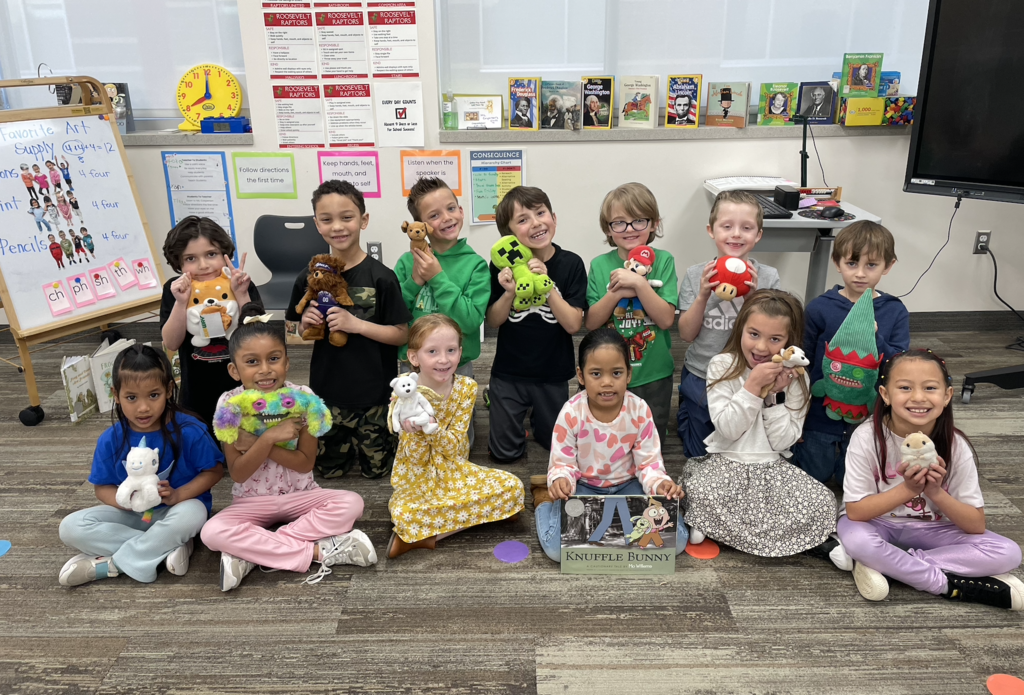 students all holding their favorite stuffed animal in coordination with the book "Knuffle Bunny"