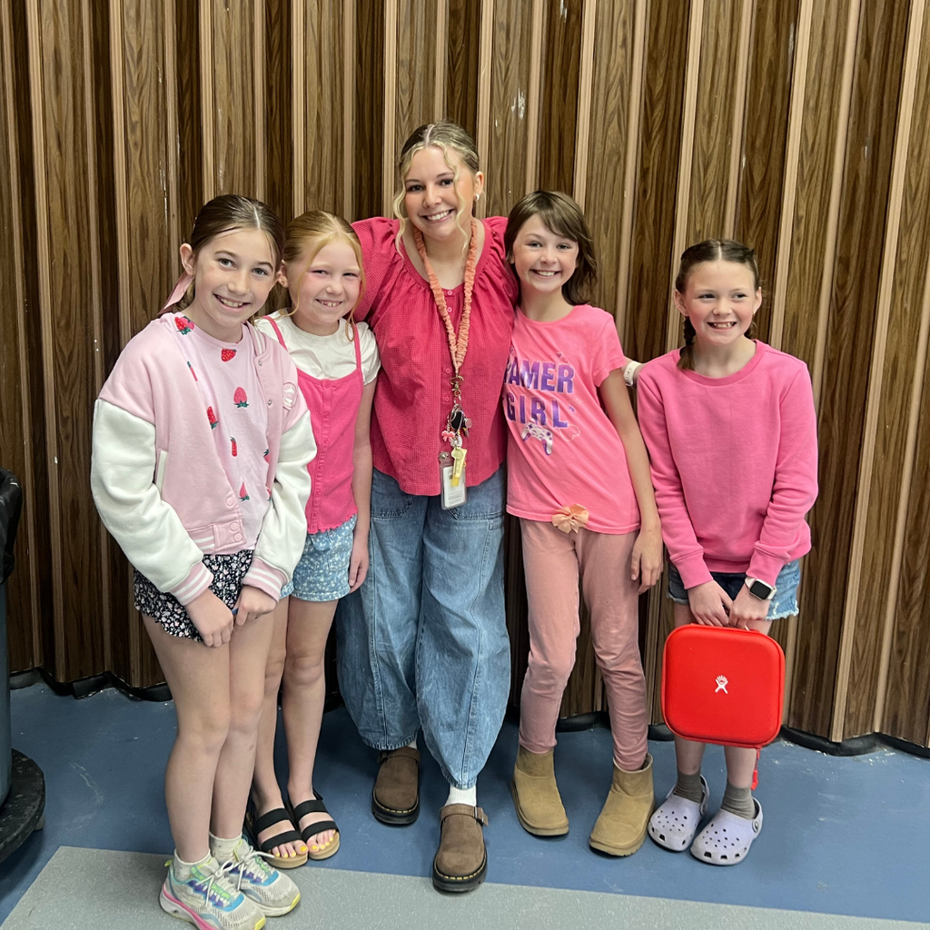 Picture of Kanesville students twinning with their teacher for twin day.