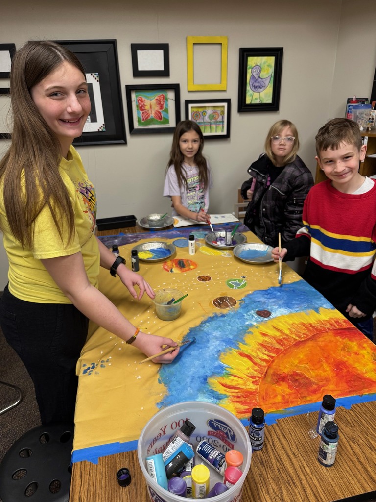 Art club painting scenery for upcoming Opera performance.
