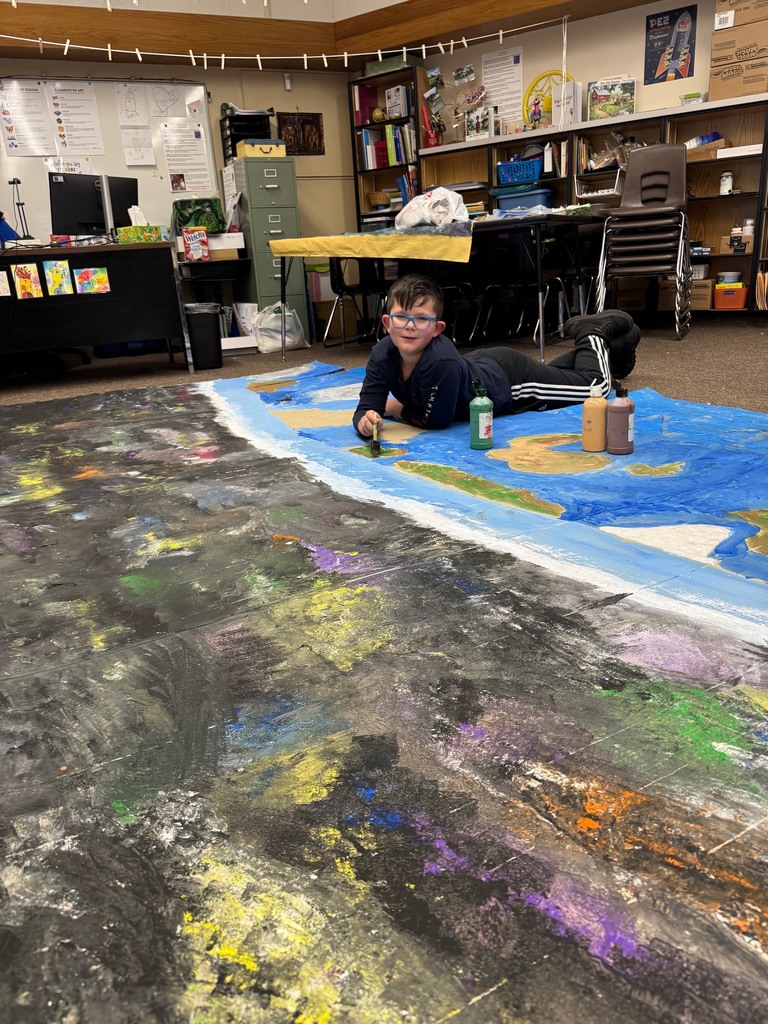 Art club painting scenery for upcoming Opera performance.