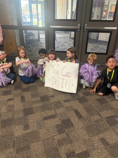 Some of our 1st graders with their posters