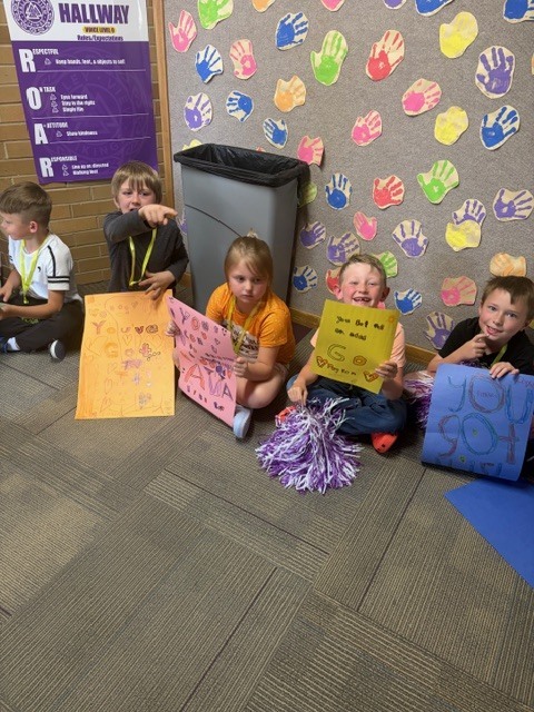 Some of our 2nd graders with their posters