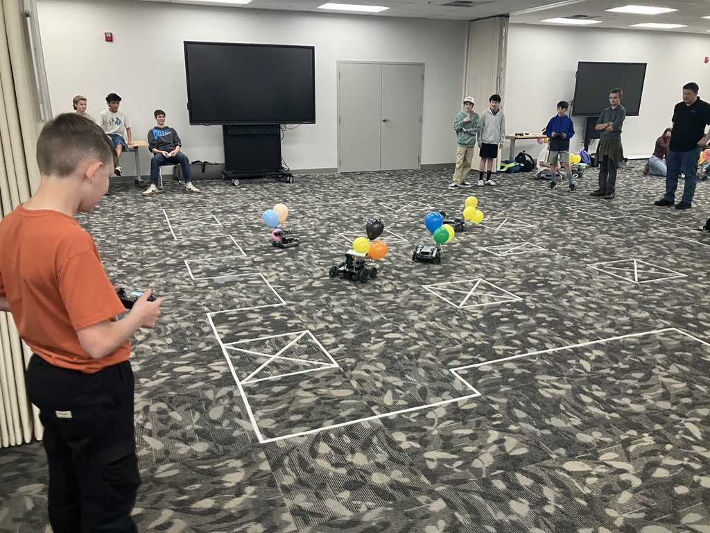 The 8th Grade Robotics class had an awesome time at the District competition on April 13th. Along with other Junior high robotics classes within the district, they were challenged to build a drivable robot that could pop the three balloons of the competition while keeping theirs safe. We took 3rd in the main, 1st and 2nd in design. Way to go Titans!!!