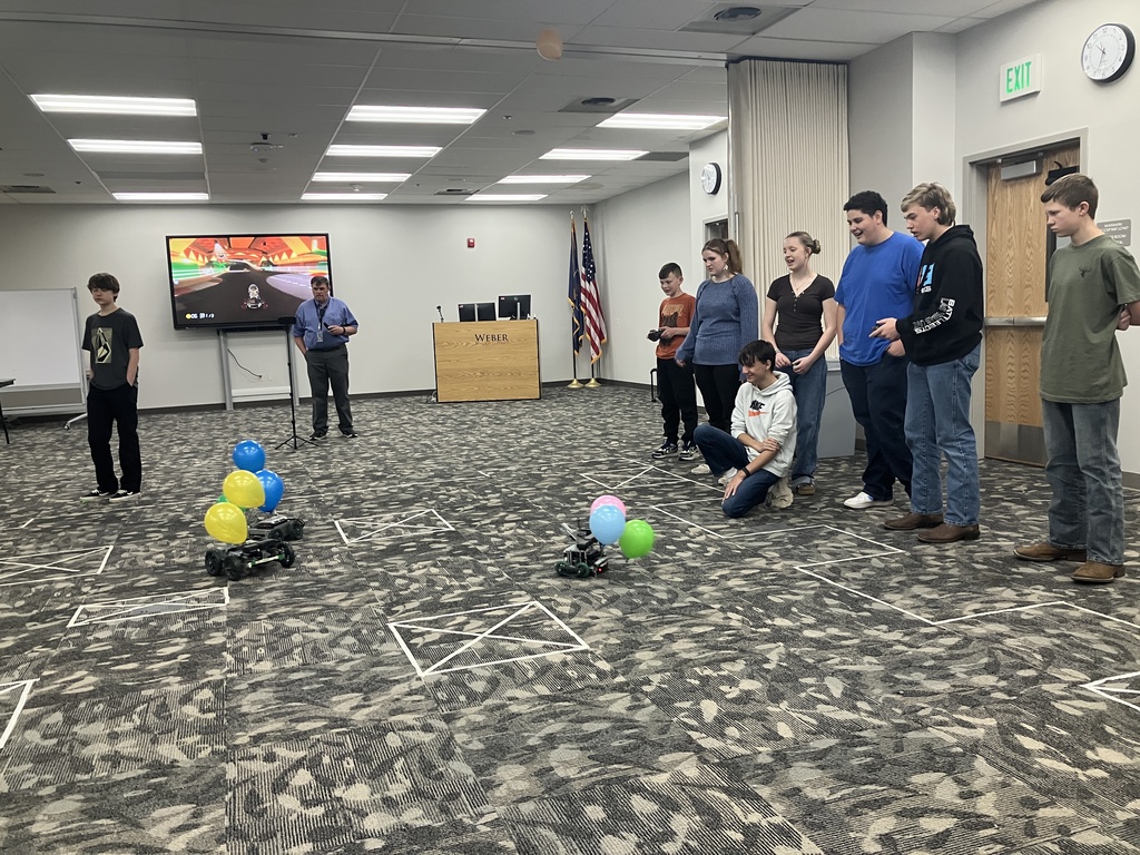 The 8th Grade Robotics class had an awesome time at the District competition on April 13th. Along with other Junior high robotics classes within the district, they were challenged to build a drivable robot that could pop the three balloons of the competition while keeping theirs safe. We took 3rd in the main, 1st and 2nd in design. Way to go Titans!!!