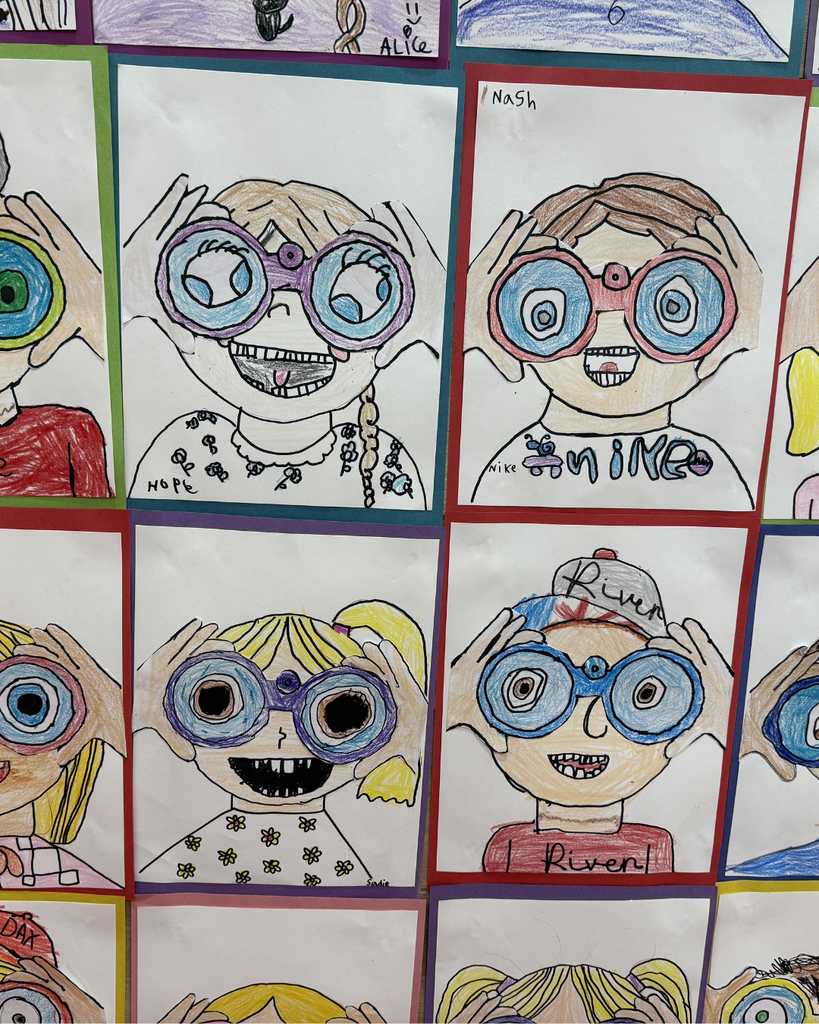 A vibrant series of clips showing students smiling and collaborating on colorful watercolor paintings. The scenes highlight their creative process and finished artwork made possible by Mrs. Reese and the BTS Foundation