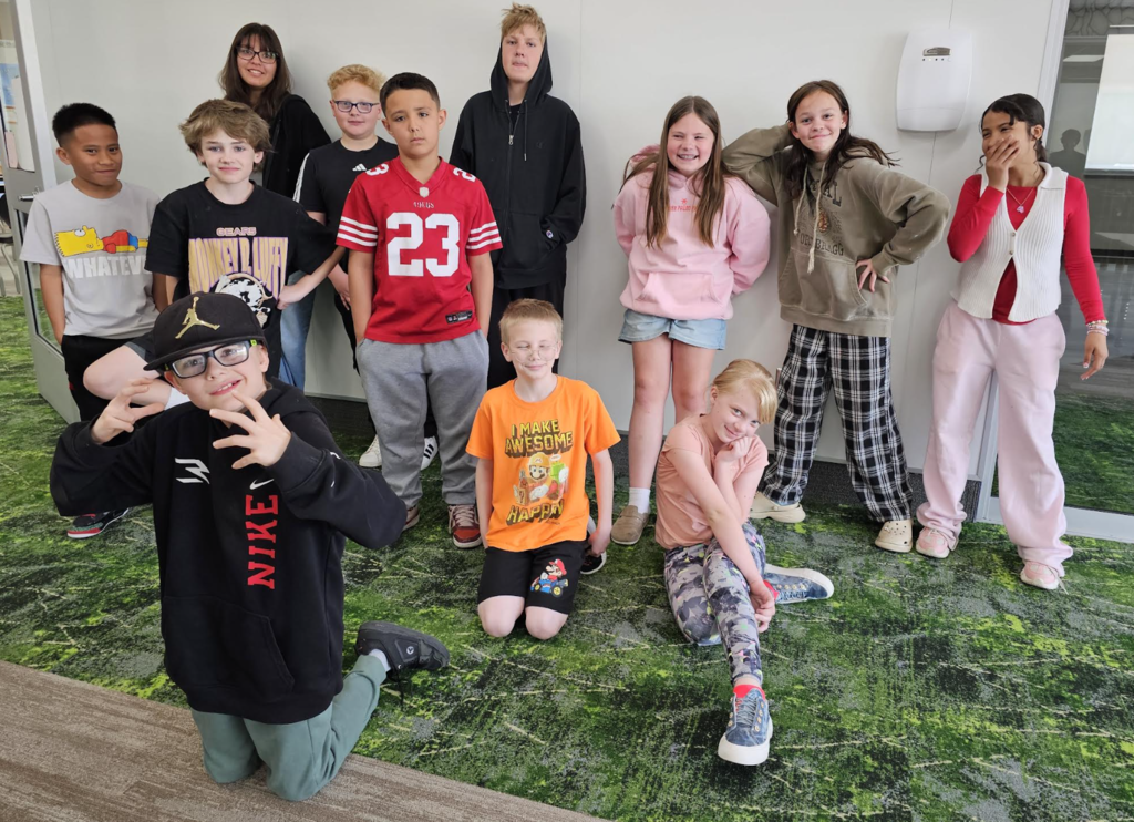 students smiling as a class