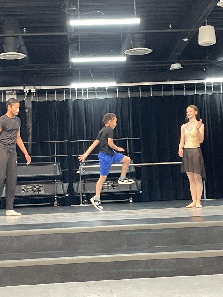 students participating with the ballet dancers