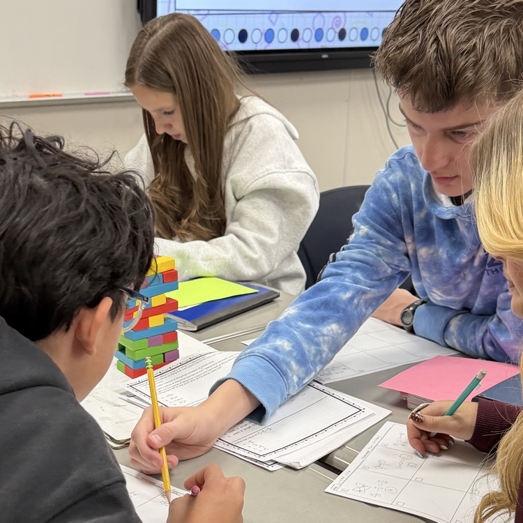 students playing jenga