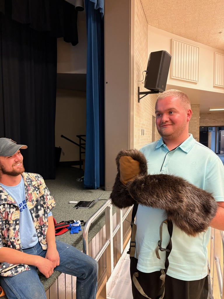Students trying on Beaver Skin Gloves
