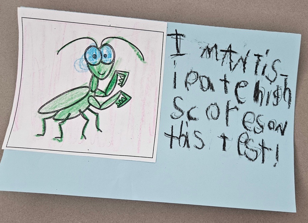 A hand-colored drawing of a green praying mantis. Handwritten text on a blue background reads: "I MANTIS-ipate high scores on this test!"