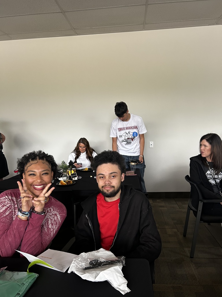 pictures of mini-term 7 Graduates with friends, family and staff
