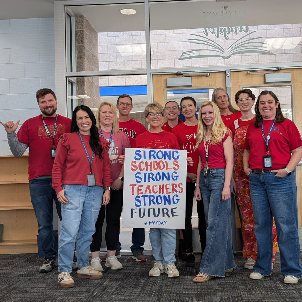 Teachers dressed in red.