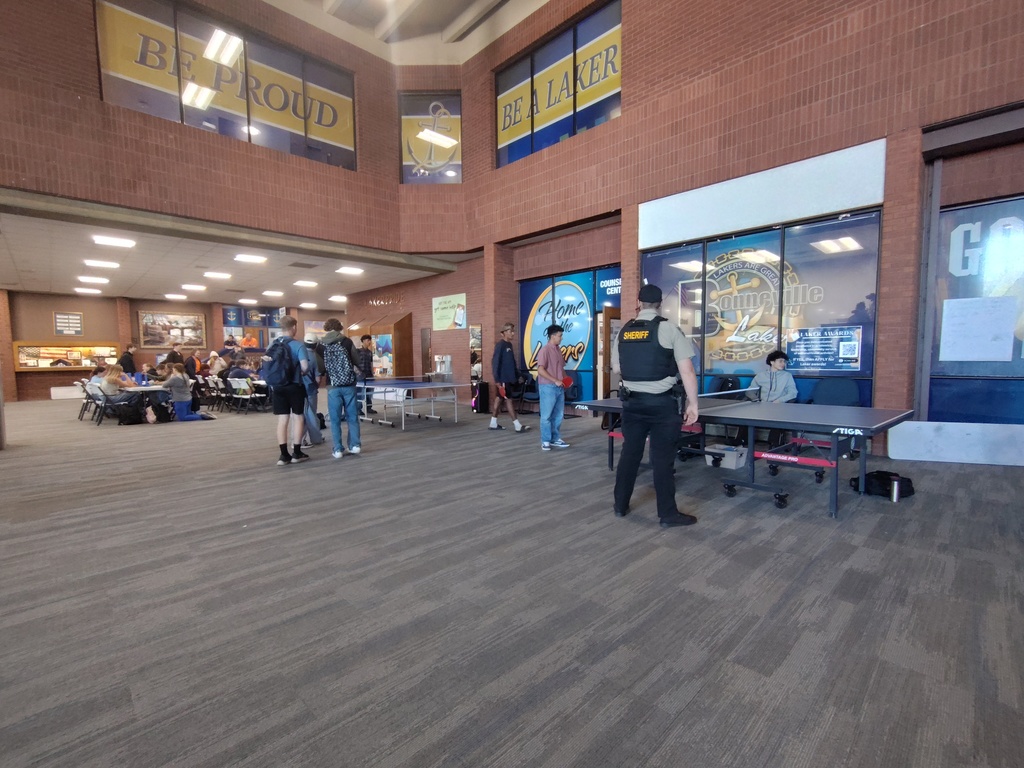 Students playing ping-pong.