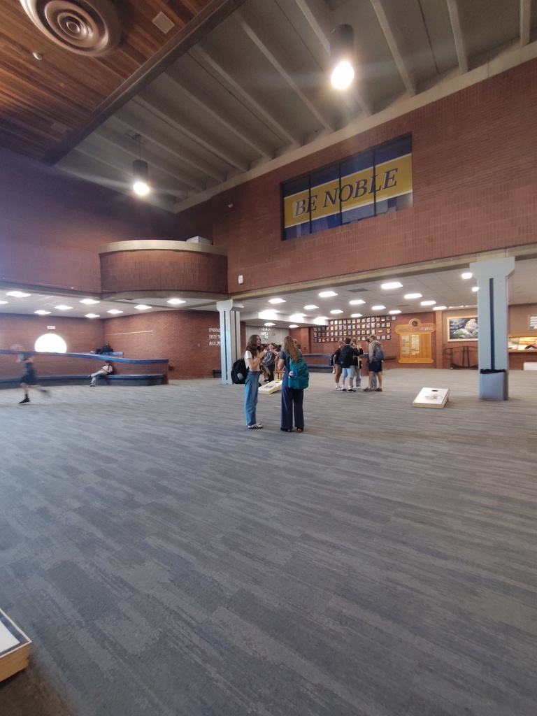 Students playing Cornhole and Jenga.