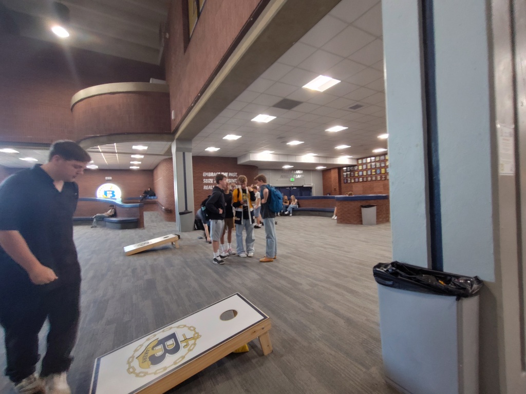 Students by Cornhole game.