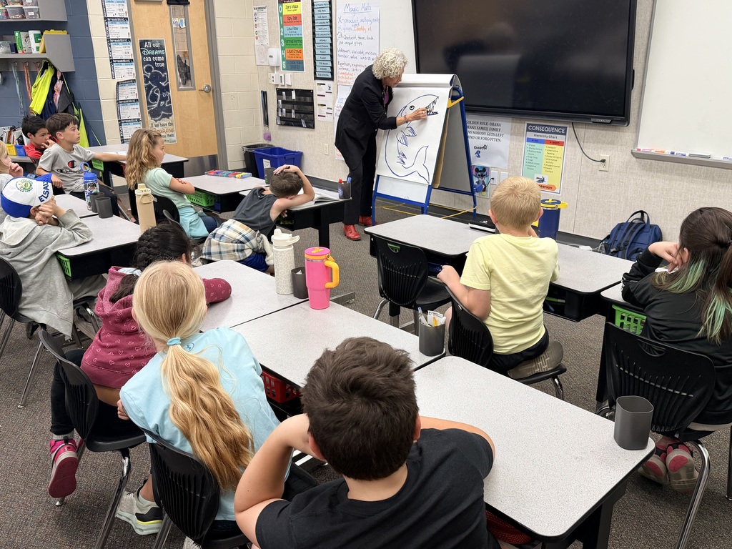 Author Ashley Wolff Presenting to students at Burch Creek Elementary. 