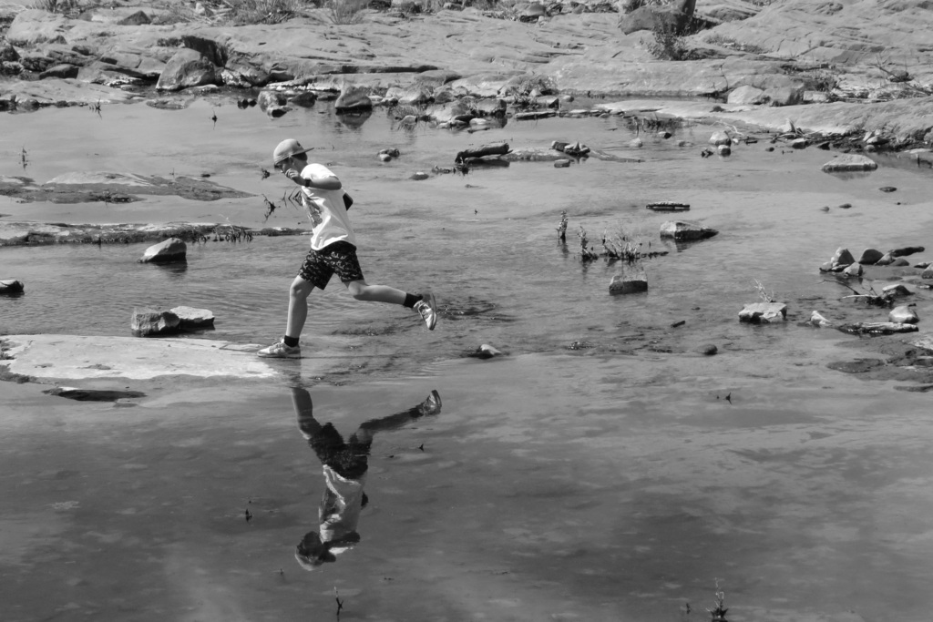 Student running in water