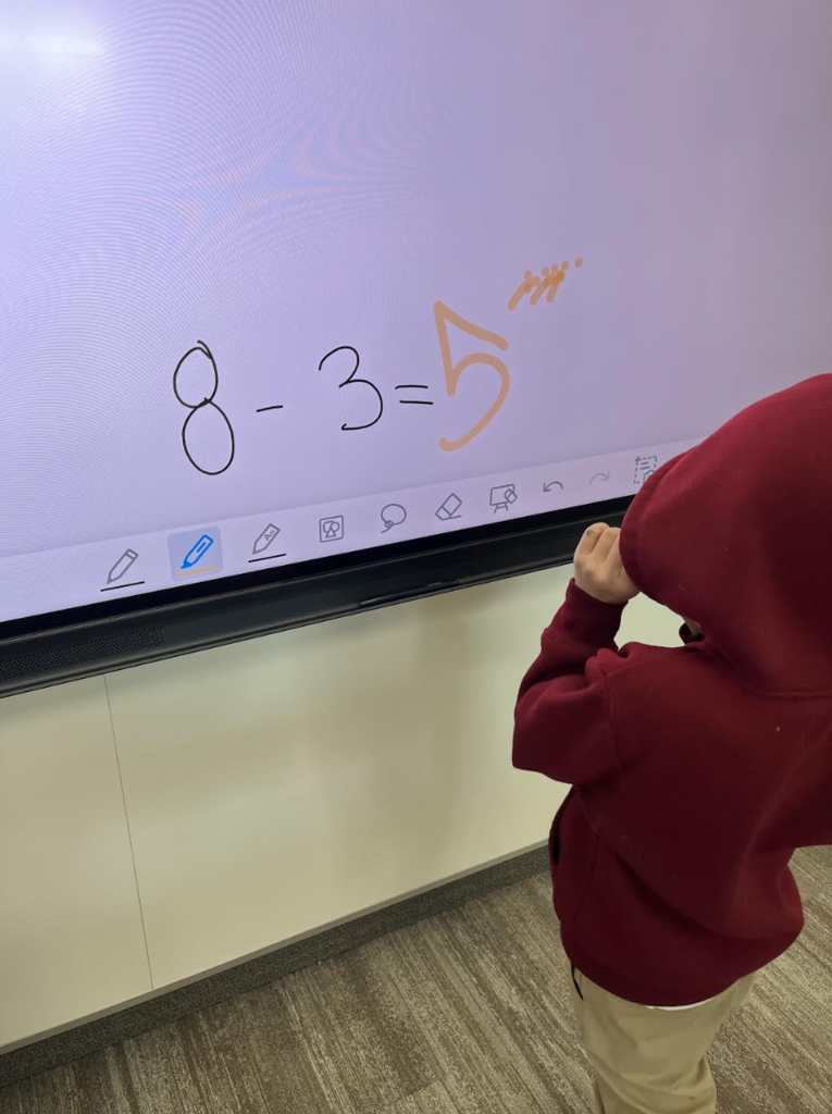 student solving a subtraction problem