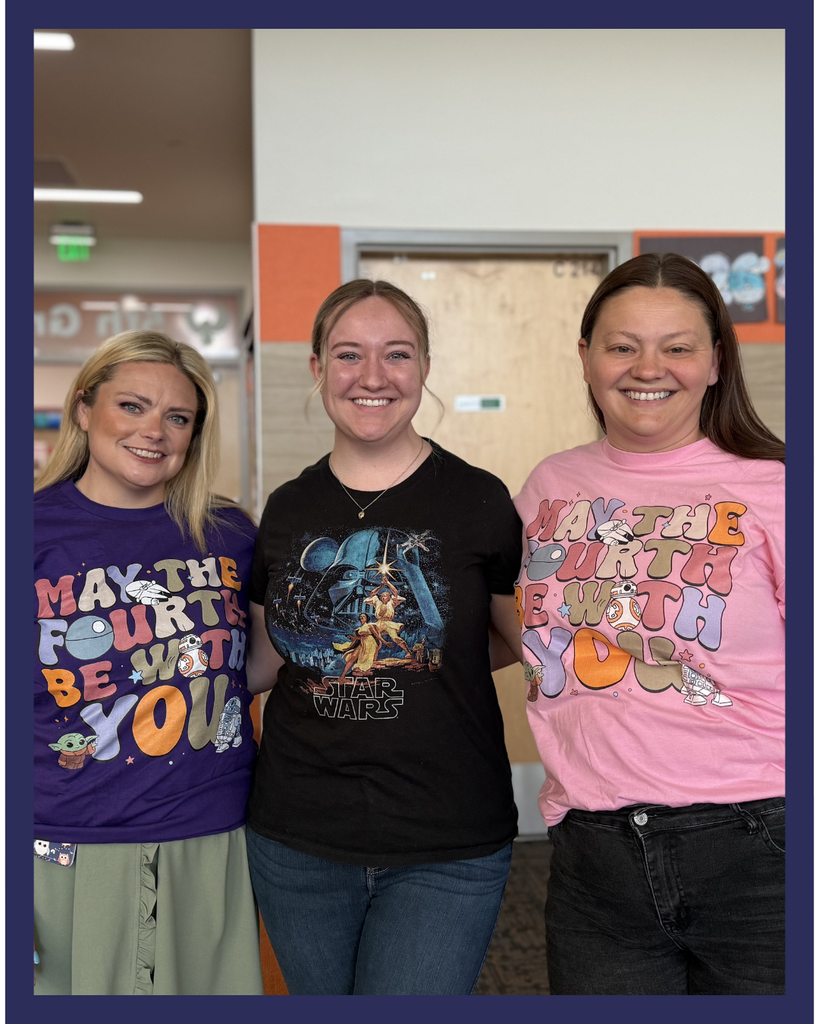 Three teachers smiling wearing Star Wars shirts in celebration of...May the 4th Be With You! 
