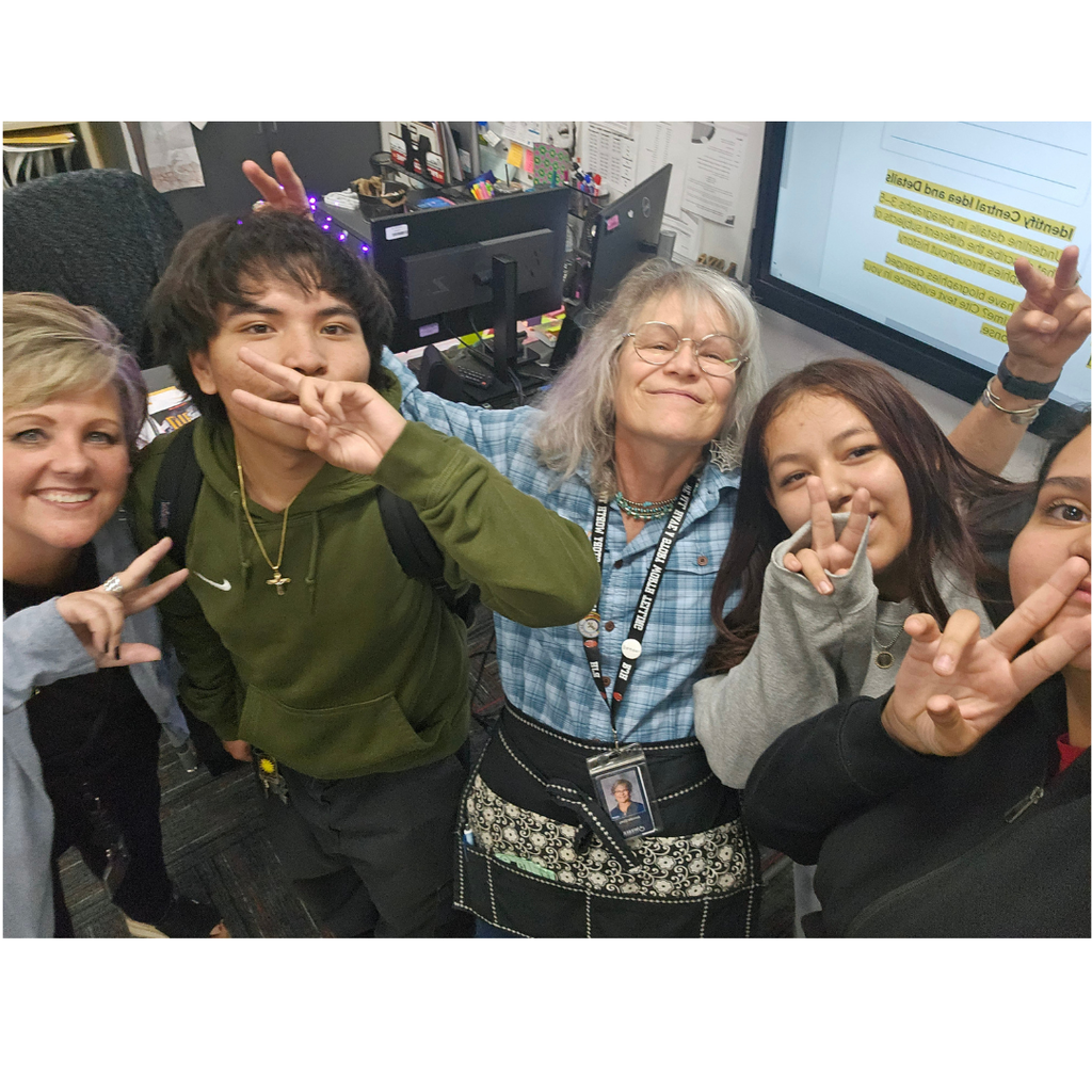 Photograph of Mrs Elzey with former Roy Jr Students
