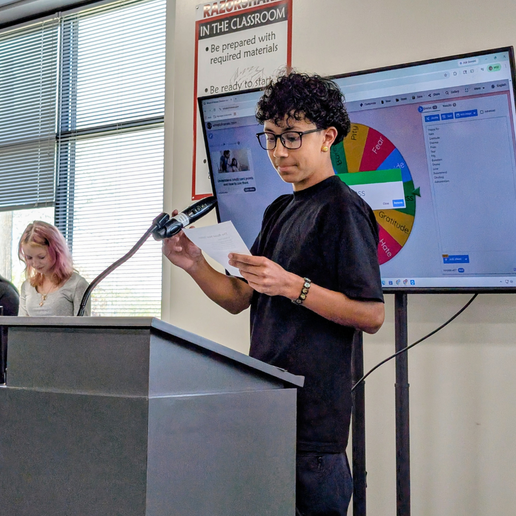 Photographs of Roy Jr High students participating in the annual Poetry Slam