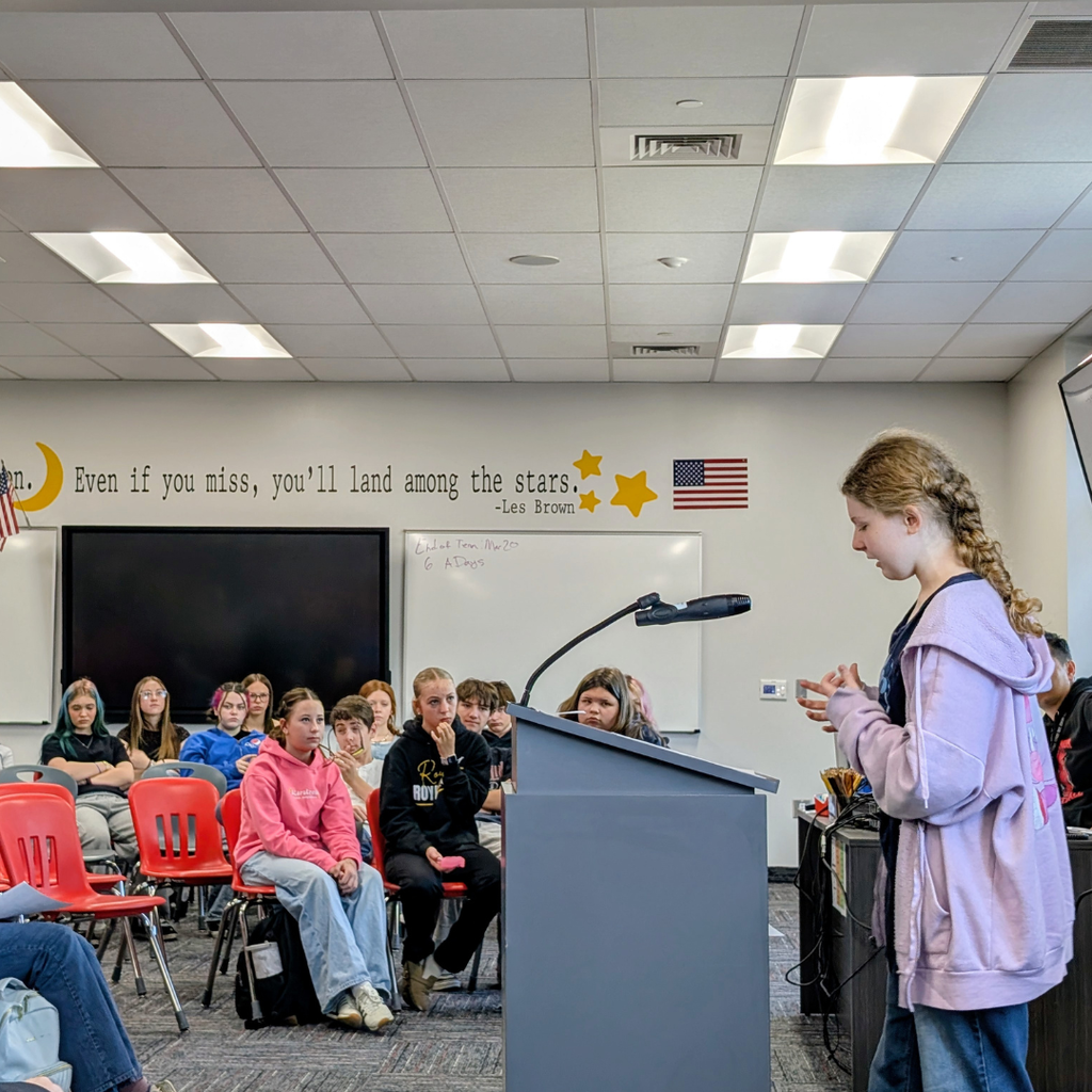 Photographs of Roy Jr High students participating in the annual Poetry Slam