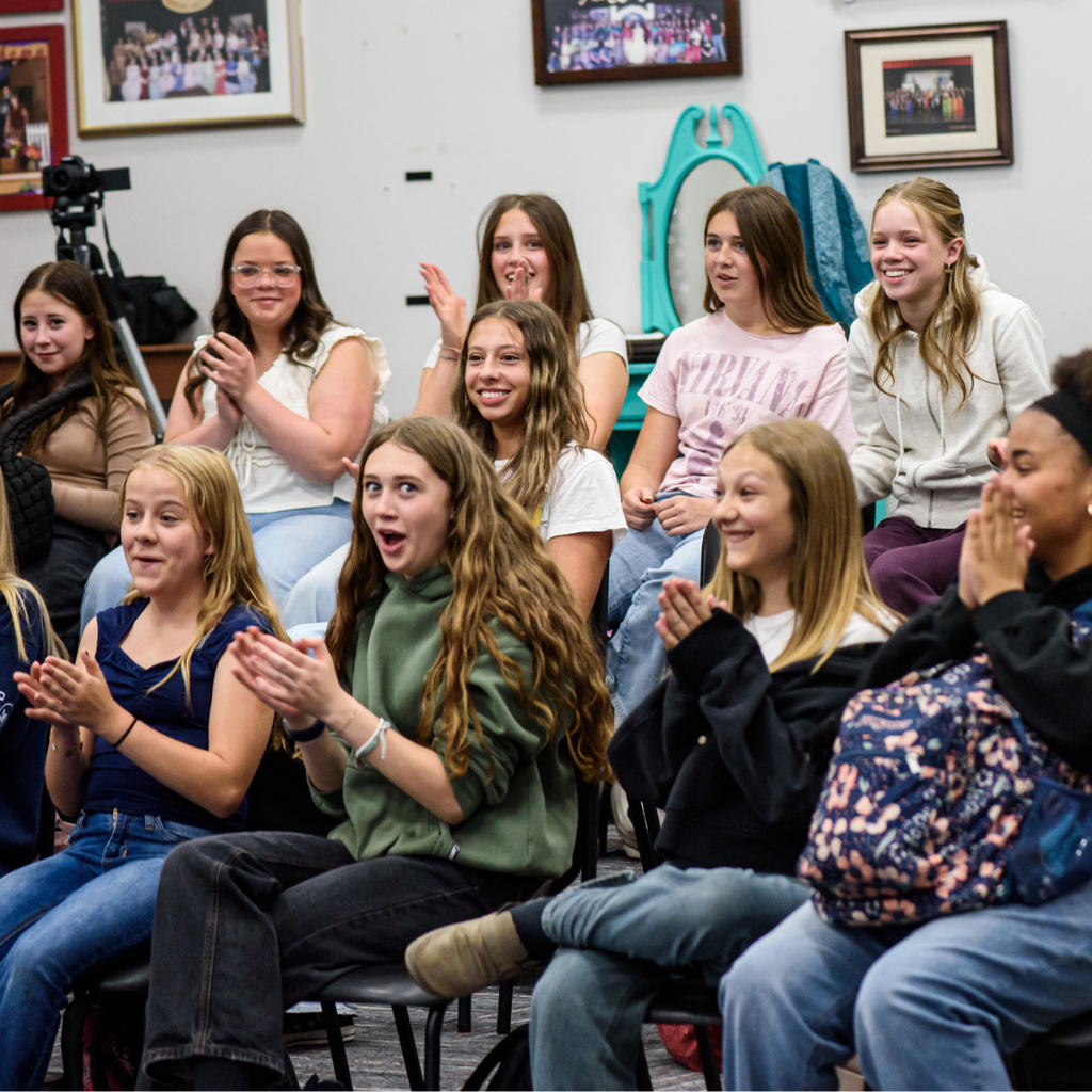 Photographs of Utah Resident Opera Artists from Opera Up Close performing at Roy Jr High.