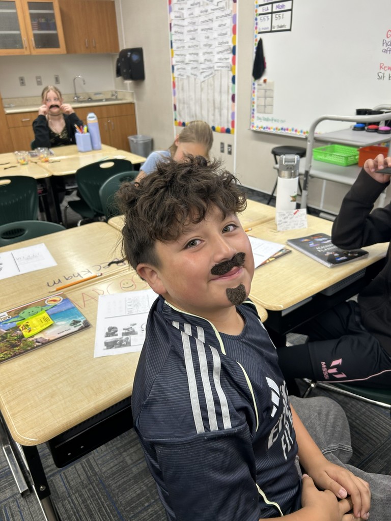 M day in 6th grade. Moustaches and Mike and Ikes.
