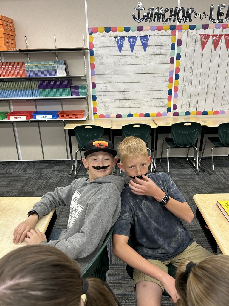 M day in 6th grade. Moustaches and Mike and Ikes.