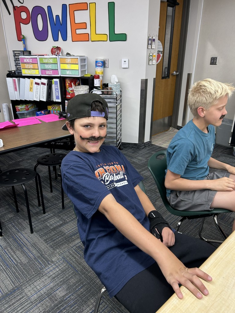 M day in 6th grade. Moustaches and Mike and Ikes.