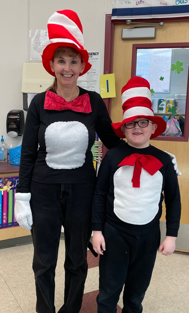 Mrs. Smith with a student both dressed up like cat and the hat