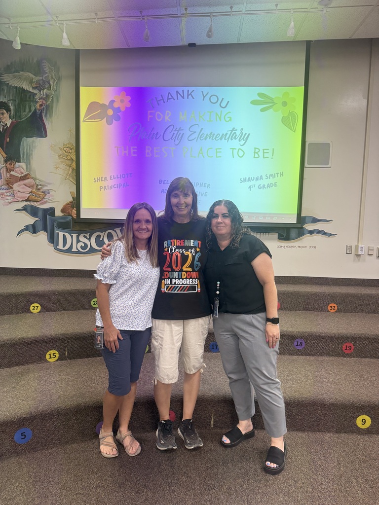 mrs. elliott, mrs. smith, and mrs. pulsipher all smiling