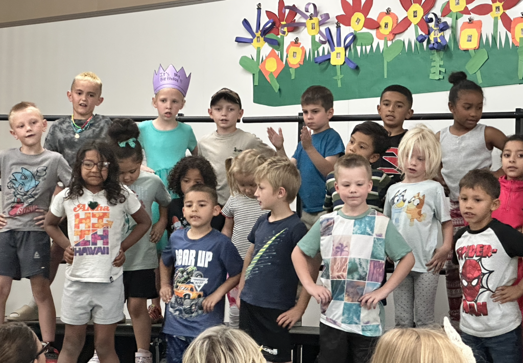 students preforming in their school program